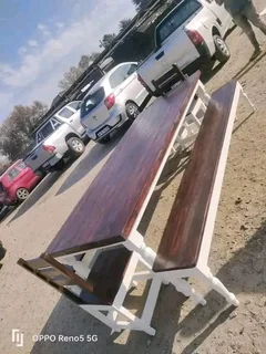 14 seater dinning table with 2 benches and 2 chairs available