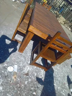 10 seater dinning table with 6 chairs and bench available