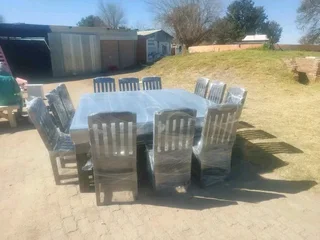 12 seater dinning table with 12 chairs available