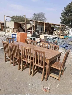 10 seater dinning table with 10 chairs available