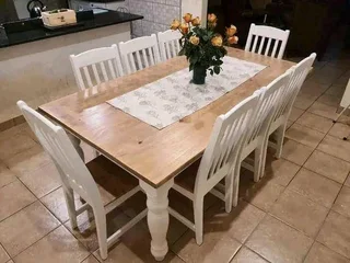 8 seater dinning table with 8 chairs available