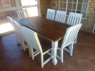 8 seater dinning table with 8 chairs available