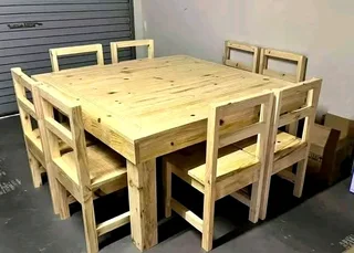 8 seater dinning table with 8 chairs available