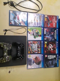 Playstation 4 Slim 500GB, with 2 original controllers and 9 Ps4 Games