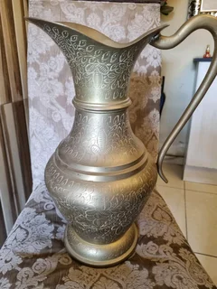Huge brass jug.
