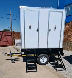 Twin Beth Toilet Trailers