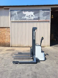 MAJOR PRICE CUTS!!Uni Carrier 1.6T Electric Walk Behind Straddle Stacker (SPOOKY SPECIALS