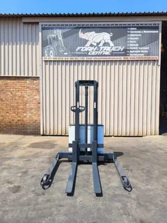 MAJOR PRICE CUTS!!Uni Carrier 1.6T Electric Walk Behind Straddle Stacker (SPOOKY SPECIALS