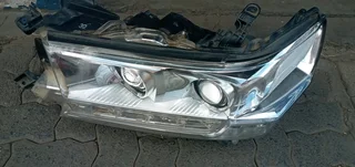 LEFT SIDE HEADLIGHT TOYOTA LAND CRUISER