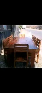 10 seater stunning dining table with chairs available for cash on delivery
