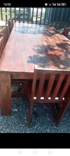 10 seater stunning dining table with chairs available for cash on delivery