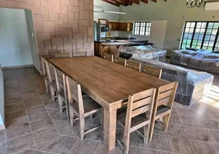 12 seater stunning dining table with chairs available for cash on delivery
