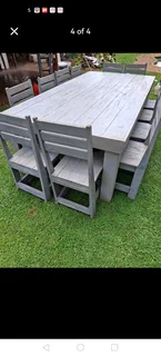 12 seater stunning dining table with chairs available for cash on delivery