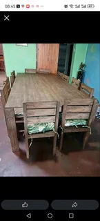 12 seater stunning dining table with chairs available for cash on delivery