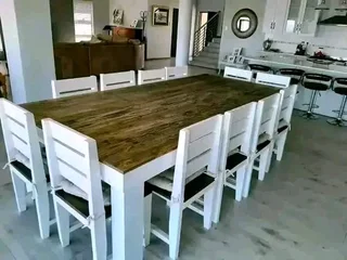 12 seater stunning dining table with chairs available for cash on delivery
