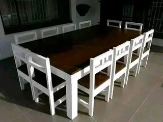 12 seater stunning dining table with chairs available for cash on delivery