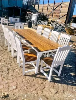 10 seater stunning dining table with chairs available for cash on delivery we charge extra delivery