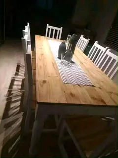 10 seater stunning dining table with chairs available for cash on delivery we charge extra delivery