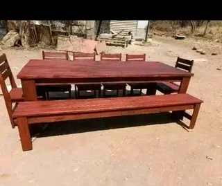 10 seater stunning dining table with chairs and bench available for cash on delivery
