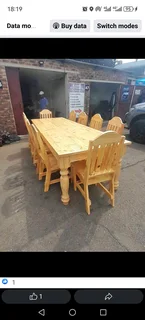 10 seater stunning dining table with chairs available for cash on delivery