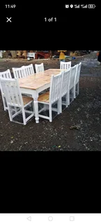 10 seater stunning dining table with chairs available for cash on delivery