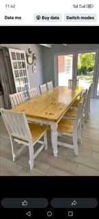 10 seater stunning dining table with chairs available for cash on delivery