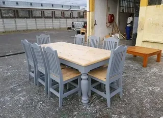 10 seater stunning dining table with chairs available for cash on delivery