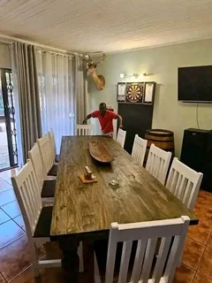 10 seater stunning dining table with chairs available for cash on delivery we charge extra delivery