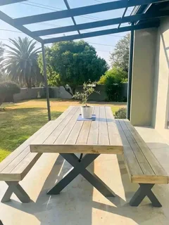 8 seater stunning crossleg dining table with benches available for cash on delivery