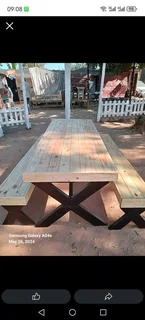 8 seater stunning crossleg dining table with benches available for cash on delivery