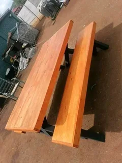 8 seater stunning crossleg dining table with benches available for cash on delivery