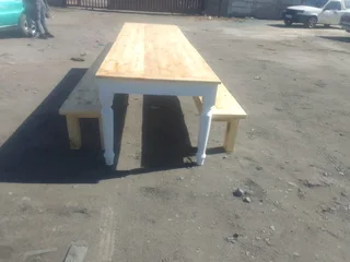 12 seater stunning dining table with benches available for cash on delivery