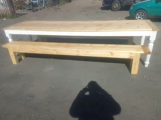 12 seater stunning dining table with benches available for cash on delivery