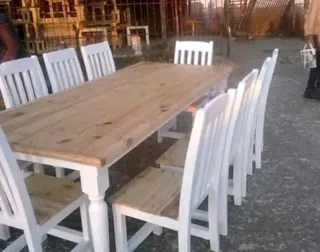 10 seater stunning dining table with chairs available for cash on delivery we charge extra delivery