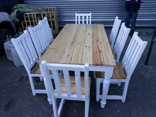 10 seater stunning dining table with chairs available for cash on delivery we charge extra delivery