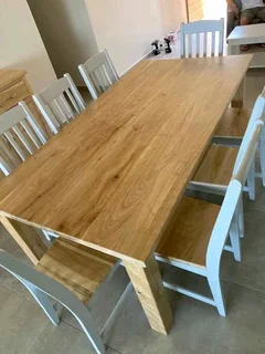 8 seater stunning dining table with chairs available for cash on delivery we charge extra delivery f