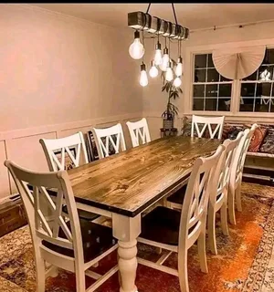 8 seater stunning dining table with chairs available for cash on delivery we charge extra delivery f