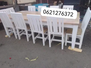 12 seater stunning dining table with chairs available