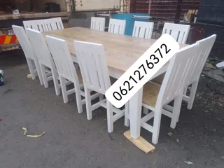 12 seater stunning dining table with chairs available