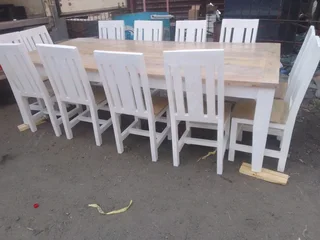 12 seater stunning dining table with chairs available