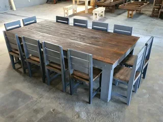 12 seater stunning dining table with chairs available for cash on delivery