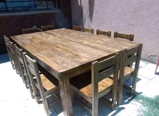 12 seater stunning dining table with chairs available for cash on delivery