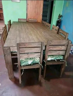 12 seater stunning dining table with chairs available for cash on delivery