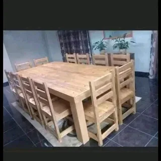 12 seater stunning dining table with chairs available for cash on delivery