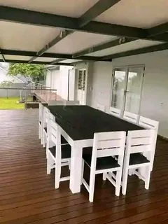 12 seater stunning dining table with chairs available for cash on delivery