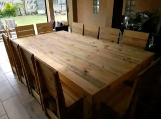12 seater stunning dining table with chairs available for cash on delivery