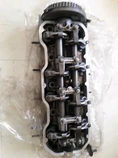 Isuzu 2.3 cyclinder head
