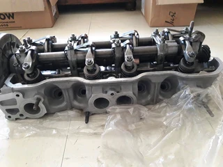 Isuzu 2.3 cyclinder head