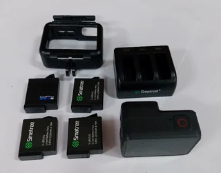 GoPro 7 Black Camera with 4 Batteries, Charger and Frame Holder