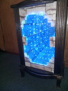 Visual illusion display cabinet